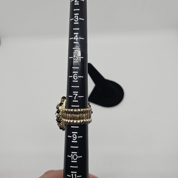 large stretch ring with gray-green cabochon and small black and white balls - Picture 4 of 5